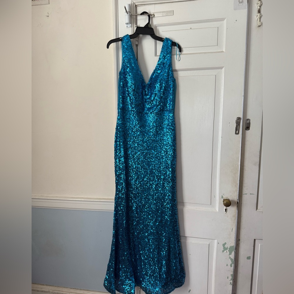 New With Tags Sequin Dress
Size 13/14
Teal Blue